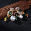 Kiss Bird brooch