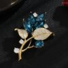 Green stone brooch