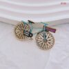 Green cycle brooch