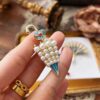 Close umbrella brooch