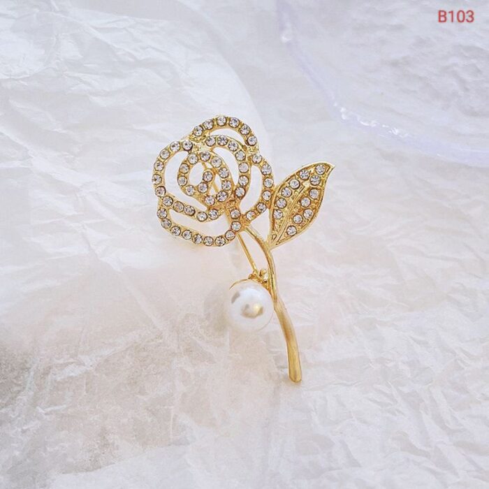 different rose brooch