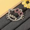 Kitty brooch