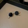 Black sunglass brooch