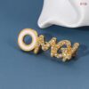Omg brooch