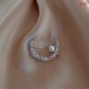 Half moon brooch