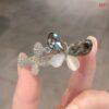 Double butterfly brooch