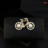 Cycle brooch