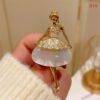 Doll brooch