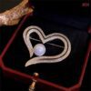 Pearl love brooch
