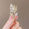 Stone leaf brooch